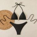 Bikini triangular con estrella dorada