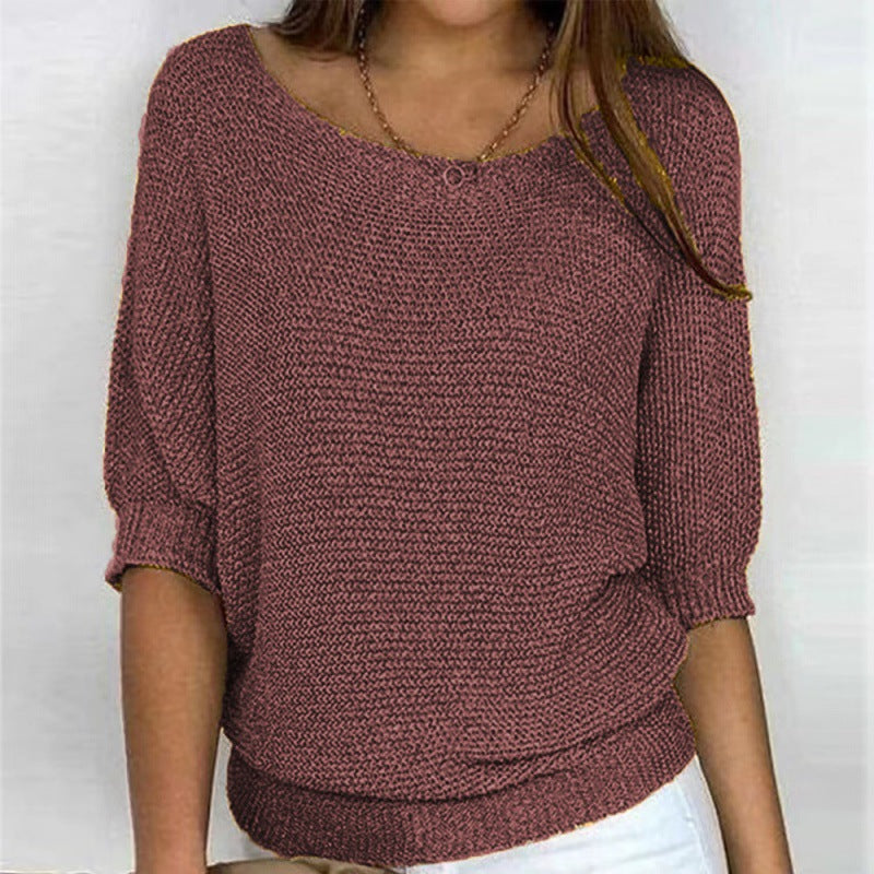 Round neck knitted sweater with elegant three quarter sleeve top for women