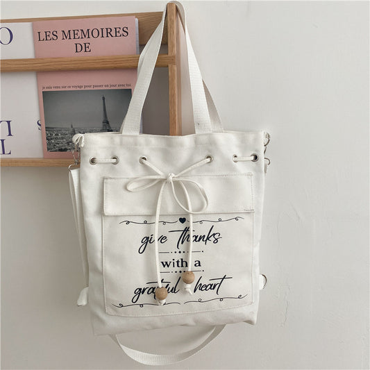 Japanese Style Letters Fresh Canvas Shoulder Bag New Student Large Capacity Drawstring Backpack Messenger Bag