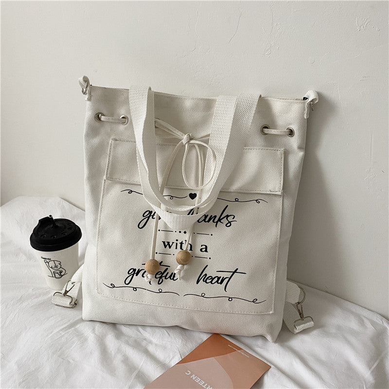 Japanese Style Letters Fresh Canvas Shoulder Bag New Student Large Capacity Drawstring Backpack Messenger Bag