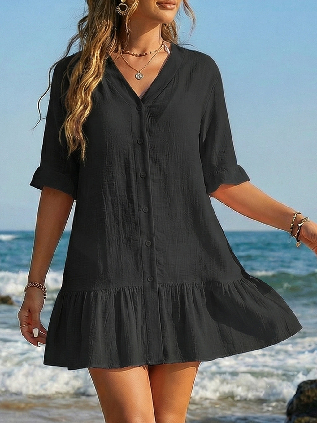 Vestido pareo con volantes y botones