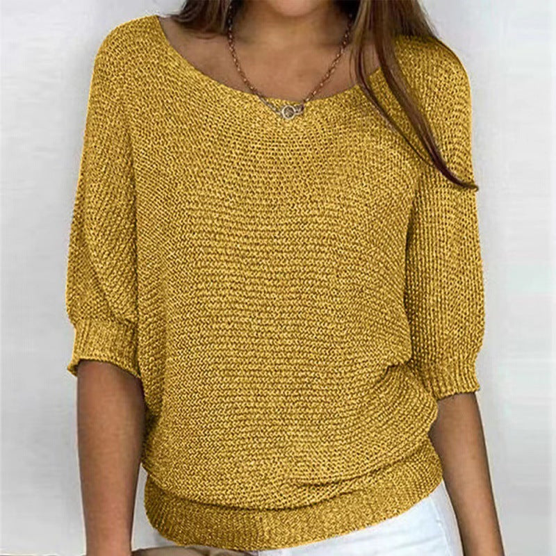 Round neck knitted sweater with elegant three quarter sleeve top for women